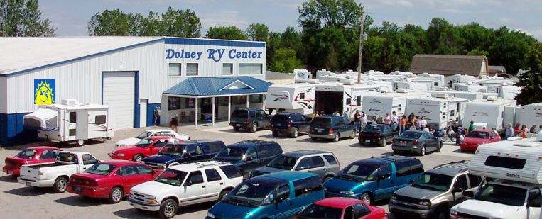 Dolney RV Center. Since 1971, view of the entire property, parking lot with cars and RV's